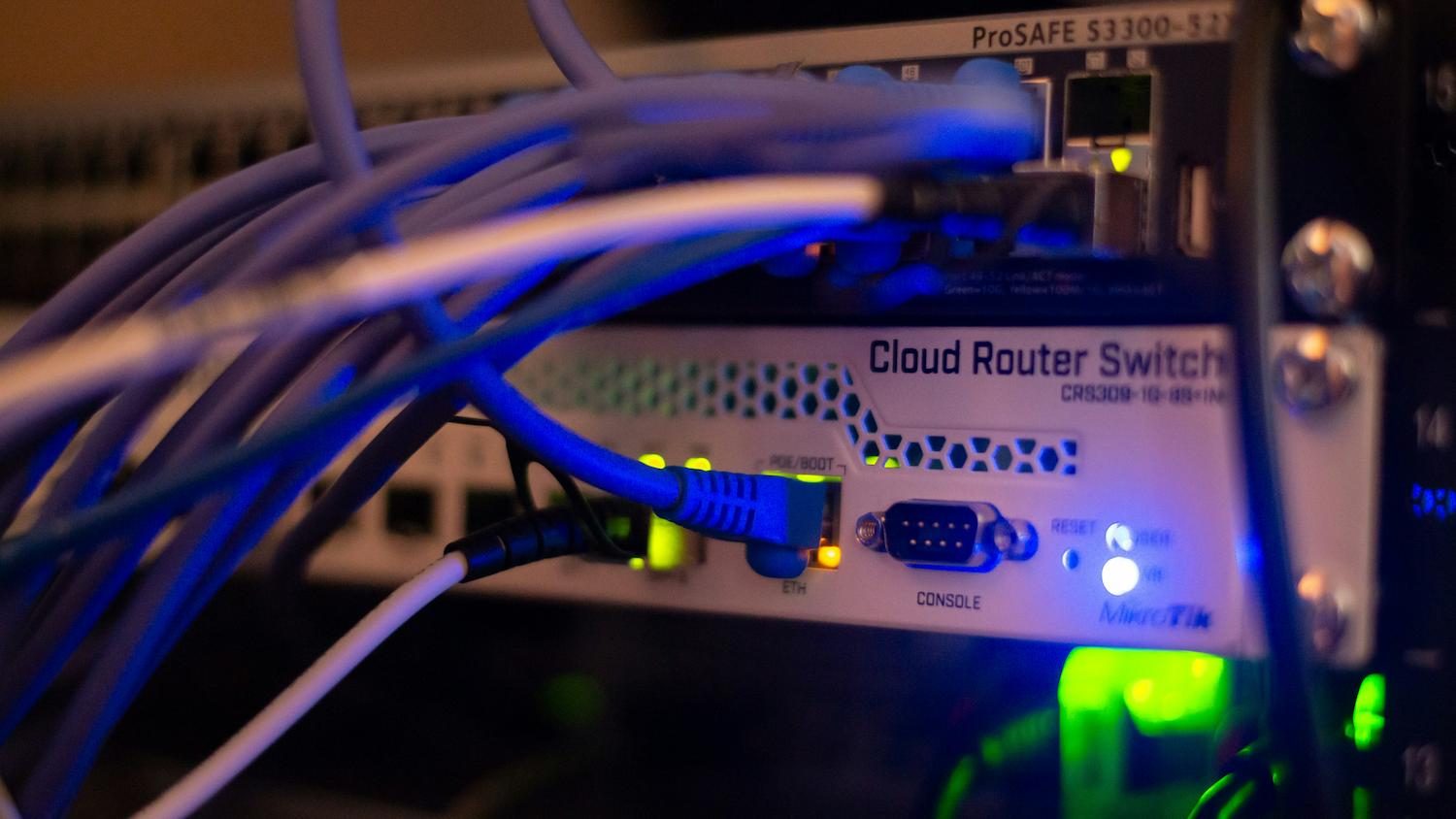 Network cabling connected to a router in a server rack